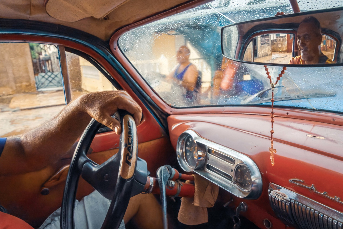 Quadro Raining on the Road