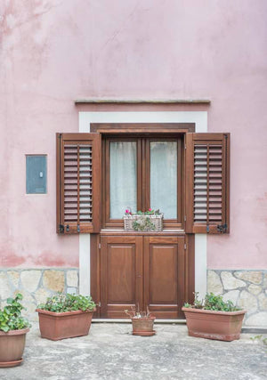 Wooden Door and a Pink Wall